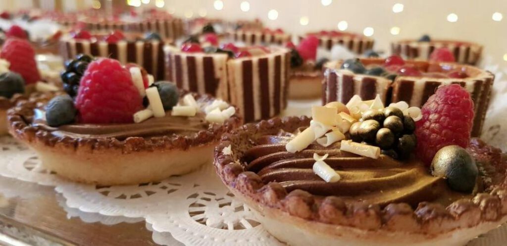 46 Piaggiobar liefert Kleingebäck Muffins Cupcakes süße Teilchen und Süßes für den Tag der offenen Tür